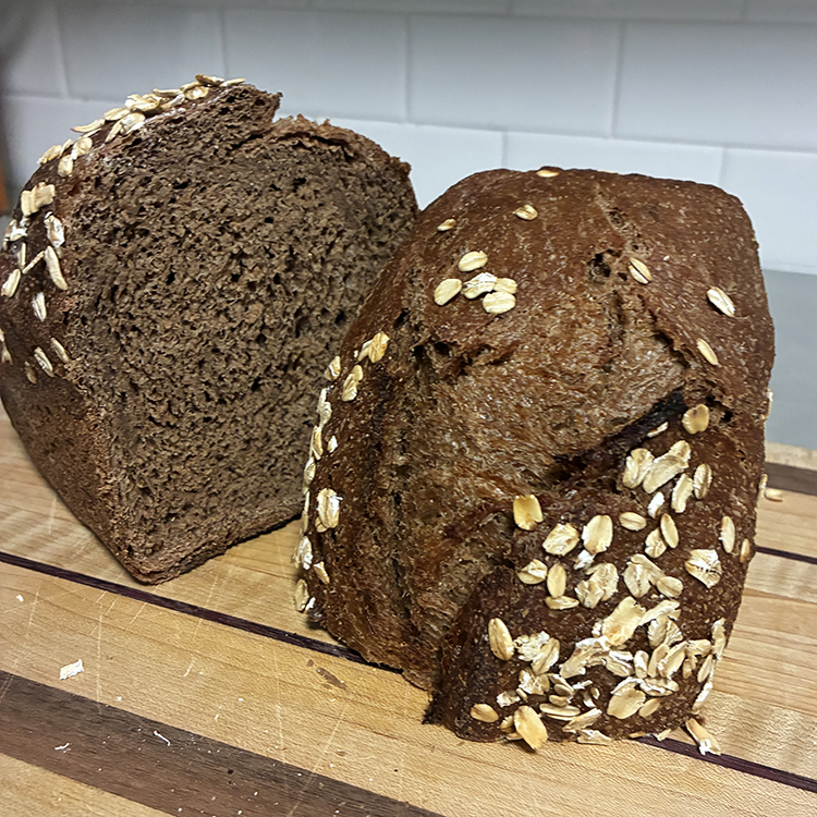 Brown bread sandwich loaf, sliced open