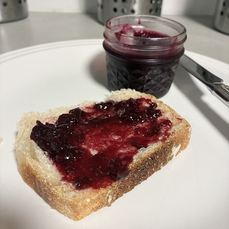 Chokecherry jam spread on a slice of sourdough